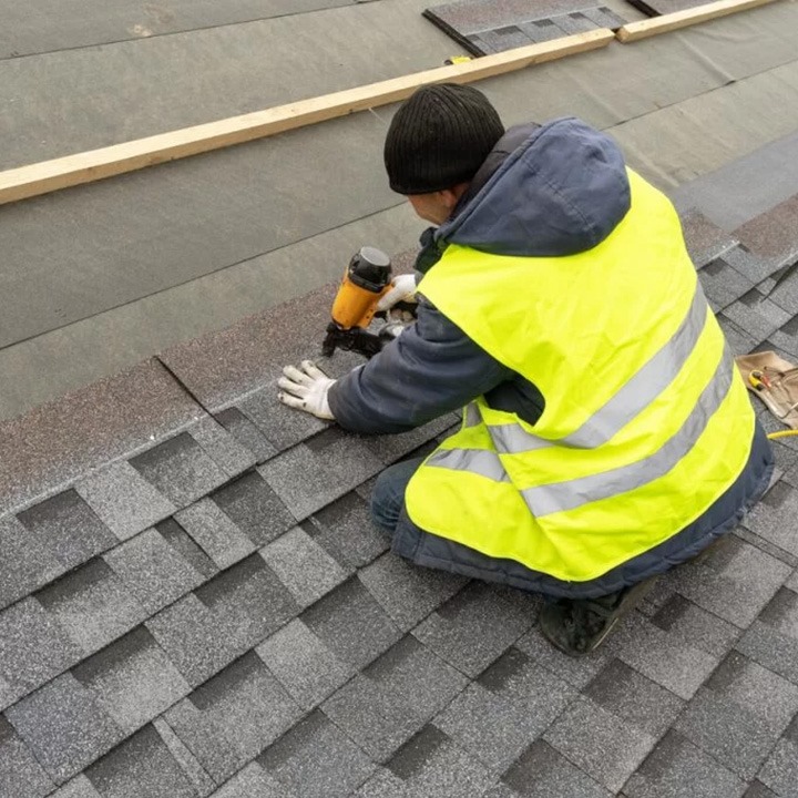 man installing roof